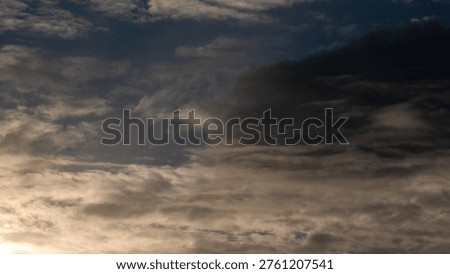 Clash Between white and dark clouds at sunset