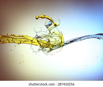 Clash Of Yellow And Blue Liquid Jets