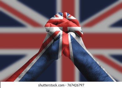 Clasped hands patterned with the Anguilla flag, multi purpose concept - isolated on flag background