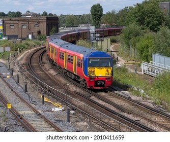 Class 456 electric train approches Guildford ,Surrey station on 13.08.19.