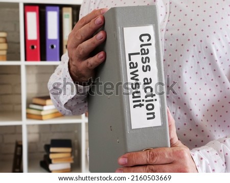 Class action lawsuit is shown using a text