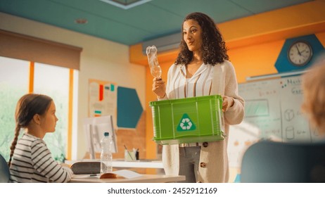 Class of Adorable Multiethnic Children Having an Information Hour About Environment, Sustainability, Plastic Waste and Recycling. Diligent Young Teacher Explaining How to Use Natural Resources Wisely - Powered by Shutterstock