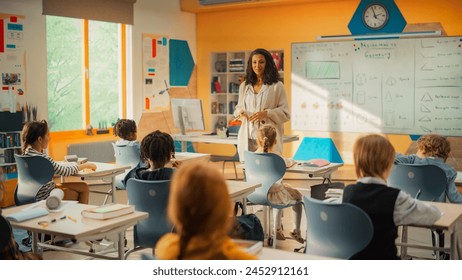 Class of Adorable Multiethnic Children Studying Mathematics and Geometry in an International Primary School. Enthusiastic Female Teacher Explains Shapes and Measurements to Young Smart School Kids - Powered by Shutterstock