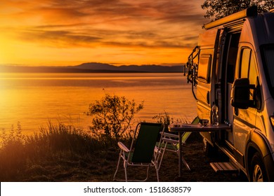 Class B Motorhome RV and the Scenic Sea Front Sunset. Road Trip Camping. Recreation Vehicle Theme. - Shutterstock ID 1518638579