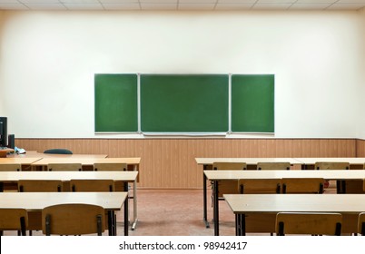  Class Room With A School Board And School Desks