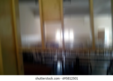 Class through window taken with motion blur effect.