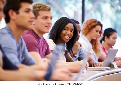 Class Of University Students Using Laptops In Lecture