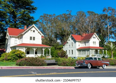 Classic 1957 Chevrolet Bel Air Four Door Sedan Parked On On The Street In Front Of Eclectic Queen Anne Architecture Style Historic Buildings - San Francisco, California, USA - 2021