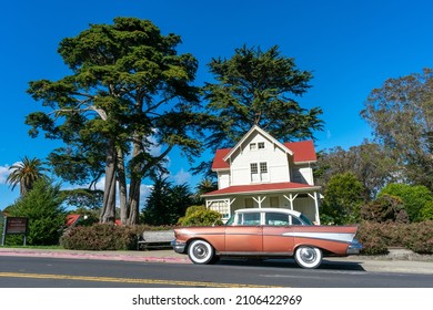 Classic 1957 Chevrolet Bel Air Four Door Sedan Vehicle Parked On On The Street In Front Of Eclectic Queen Anne Architecture Style Historic Home - San Francisco, California, USA - 2021