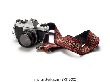 A classic 35mm film camera isolated on white.