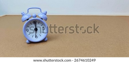 Classic alarm clock representing countdown, time reminder, deadline pressure, wake up call, urgency, schedule planning, and daily morning lifestyle routine concept. 