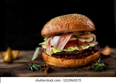 Classic american beef burger. Unhealthy food concept. Fasrfood on dark background. - Powered by Shutterstock