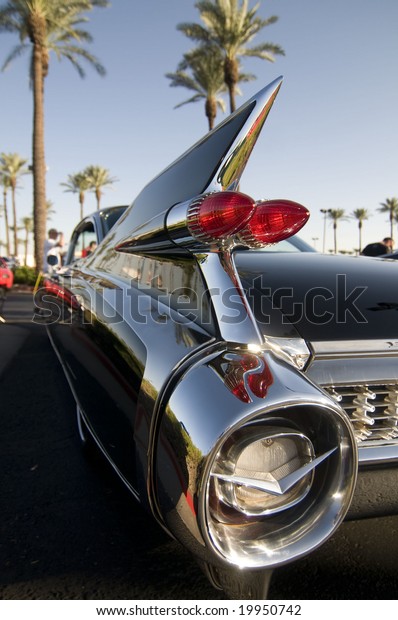 Classic American\
Car with cool chrome tail\
fin