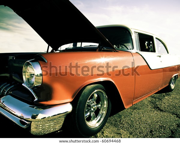 Classic\
American car with it\'s hood up./Vintage\
Car