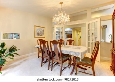 Classic American Dining Room Interior With Open French Doors.