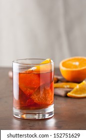 Classic Americano Cocktail With An Orange Slice On Wooden Table