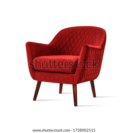 Classic armchair art deco style in red velvet with wooden legs isolated on white background. Front view, grey shadow. Series of furniture
