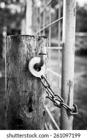 Classic Australian Farm Gate Lock On A Wooden Post In Black And White