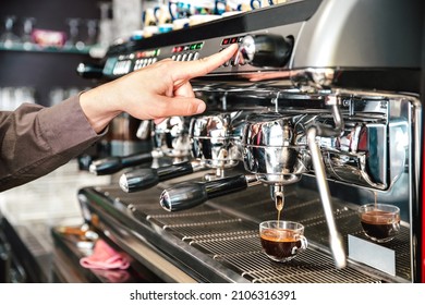 Classic Barista Hand Pouring Italian Espresso On Coffee Bar Machine At Fashion Cafeteria - Food And Beverage Industry Concept With Professional Barman At Cafe Stand Working Station - Bright Filter