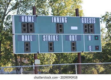 Classic Baseball Scoreboard Captured On A Little League Field In The Rural Midwest