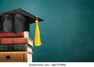 Classic Black Graduation Cap With Tassel And Books