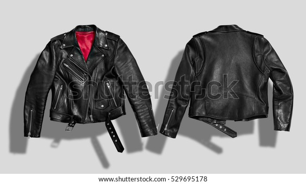 Classic black\
leather bikers\' jacket with silk red lining shot from the front and\
the back isolated on\
white