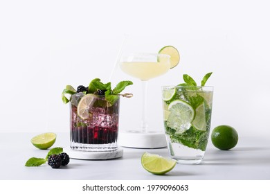 Classic And Blackberry Mojito, Margarita Cocktail With Lime On Modern Color Background. Three Summer Freshness Beverage For Festive Party. Summer Holiday Mocktail.