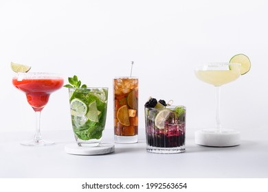 Classic And Blackberry Mojito, Margarita Cocktail With Lime On Modern Still Life With Podium On White Background. Summer Freshness Beverage For Festive Party. Summer Holiday Mocktail.