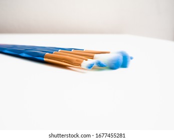 Classic Blue Eyeshadow Brushes Isolated On White Background With Space For Copy Space.