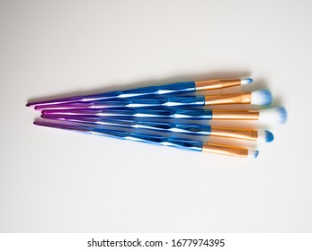 Classic Blue Eyeshadow Brushes Isolated On White Background With Space For Copy Space.