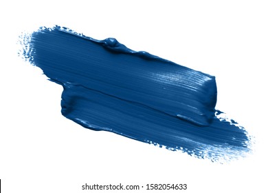 Classic blue lipstick smear smudge isolated on white background. Trendy color makeup swatch