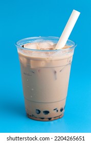 A Classic Boba Tea On A Bright Blue Background