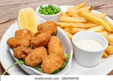 Classic British Scampi And Chips With Peas And Tartar Sauce