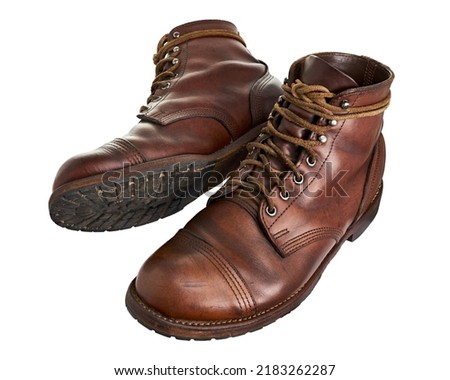 Classic brown leather boots, Men’s brown ankle boots, isolated on white background with clipping path                                                                             