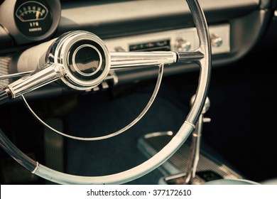 Classic Car With Close-up On Steering Wheel