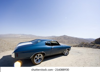 Classic Car In Desert (lens Flare)