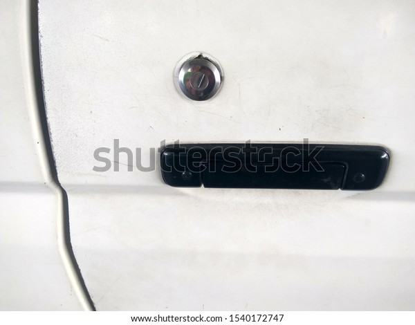 classic car door handle\
and unique key