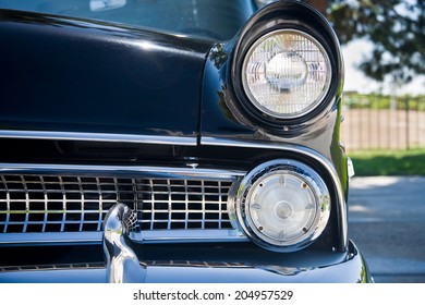 Classic Car Headlights And Grill Looking Head On. 