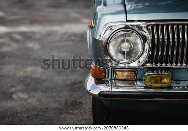 Classic car\
headlights. Vintage\
automobile