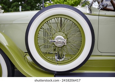 Classic Car Spoked Wheel and White-Wall Tire Detail - Powered by Shutterstock