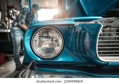 Classic Cars Restoration Worker Next to His Restored Vehicle. Retro Collectibles Theme. - Powered by Shutterstock