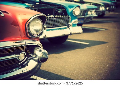 Classic cars in a row - Shutterstock ID 377172625