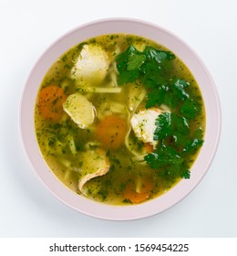 Classic Chicken Noodle Soup With Carrot And Parsley Isolated On White