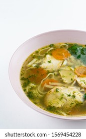 Classic Chicken Noodle Soup With Carrot And Parsley Isolated On White