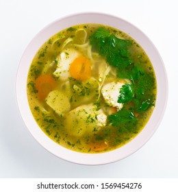 Classic Chicken Noodle Soup With Carrot And Parsley Isolated On White