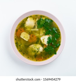 Classic Chicken Noodle Soup With Carrot And Parsley Isolated On White