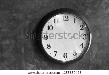  Classic clock no
clockwise hang on wall background,black and white picture.