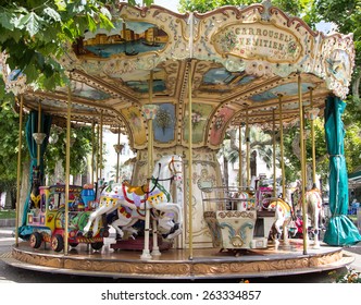 A Classic And Colorful Old Merry Go Round In Cannes, France