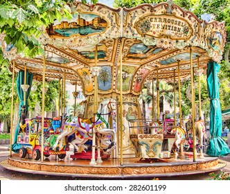 A Classic And Colorful Old Merry Go Round In Cannes, France