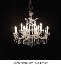 Classic Crystal Chandelier Isolated On Black Background